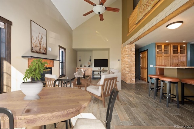 127 Silver Sage Rd, Granby, CO 80446 - dining area with dark wood finished floors, high vaulted ceiling, and ceiling fan
