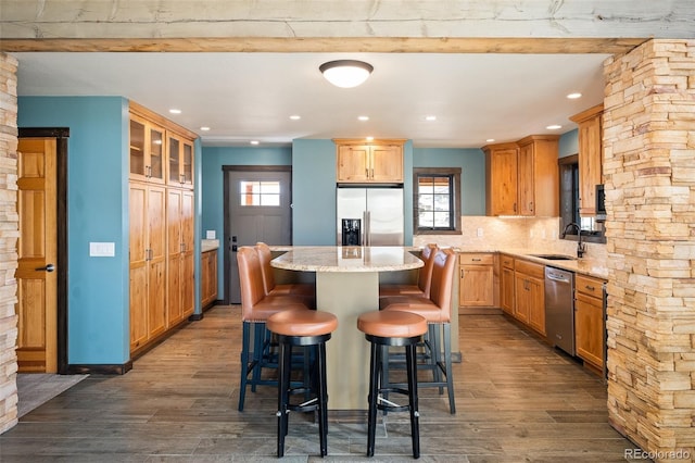 127 Silver Sage Rd, Granby, CO 80446 - kitchen with dark wood finished floors, a healthy amount of sunlight, appliances with stainless steel finishes, and a sink