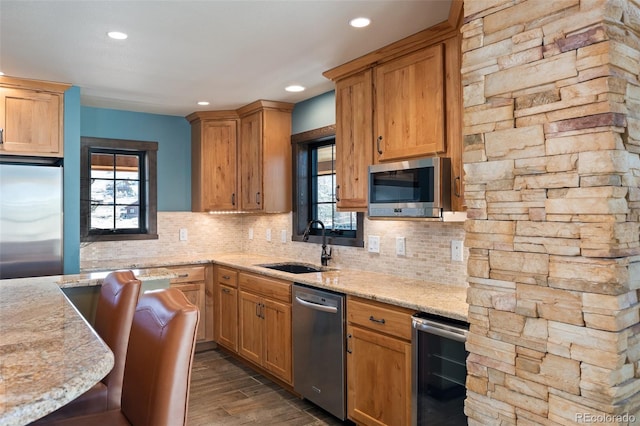 127 Silver Sage Rd, Granby, CO 80446 - kitchen featuring recessed lighting, appliances with stainless steel finishes, a sink, and wine cooler