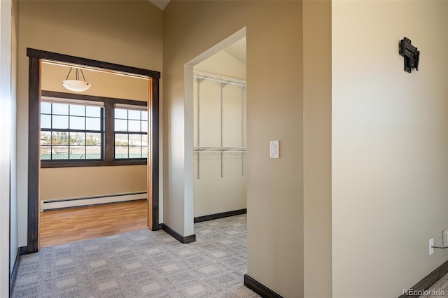 127 Silver Sage Rd, Granby, CO 80446 - hall with baseboard heating, baseboards, and carpet flooring