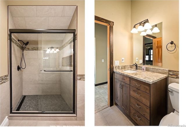 127 Silver Sage Rd, Granby, CO 80446 - bathroom featuring a shower stall, toilet, vanity, and tile patterned flooring