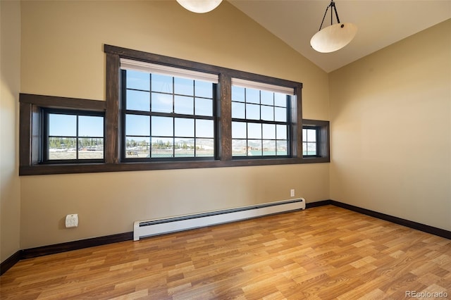 127 Silver Sage Rd, Granby, CO 80446 - unfurnished room with a baseboard radiator, baseboards, and light wood-style floors