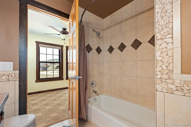 127 Silver Sage Rd, Granby, CO 80446 - bathroom featuring shower / bath combo with shower curtain, a ceiling fan, baseboards, and toilet