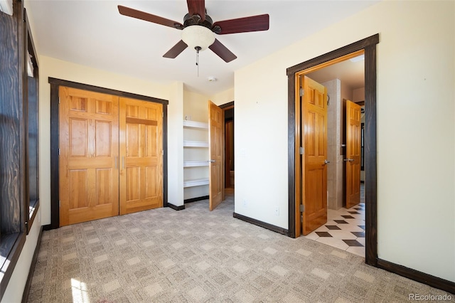 127 Silver Sage Rd, Granby, CO 80446 - unfurnished bedroom with ceiling fan, baseboards, a closet, and light colored carpet