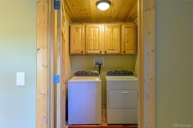 127 Silver Sage Rd, Granby, CO 80446 - washroom with washing machine and clothes dryer, wood ceiling, and cabinet space