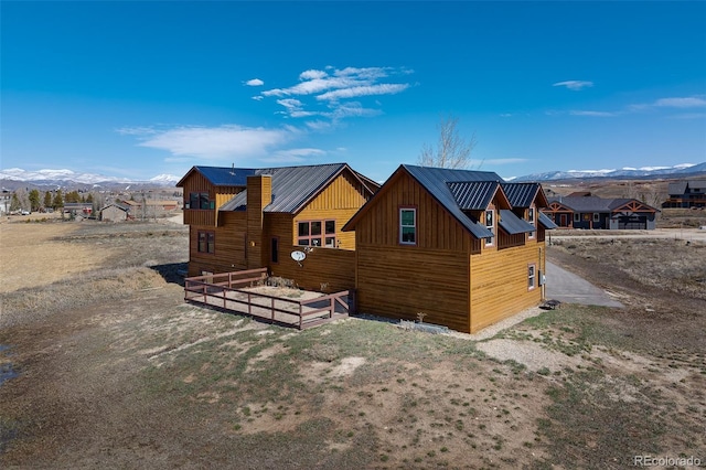 127 Silver Sage Rd, Granby, CO 80446 - view of front facade featuring a mountain view and metal roof