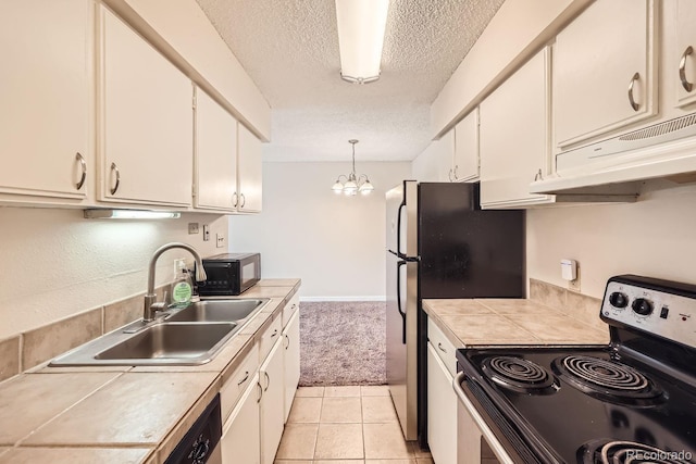 kitchen with sink, hanging light fixtures, stainless steel appliances, a chandelier, and white cabinets