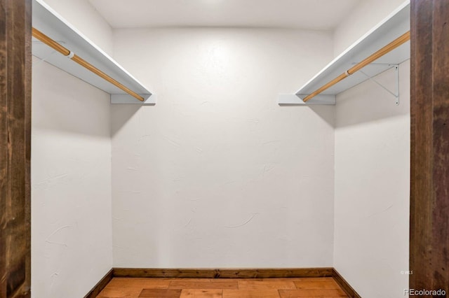 4513 County Road 323, Westcliffe, CO 81252 - walk in closet featuring wood finished floors
