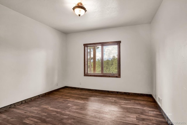 4513 County Road 323, Westcliffe, CO 81252 - unfurnished room with dark wood-style floors
