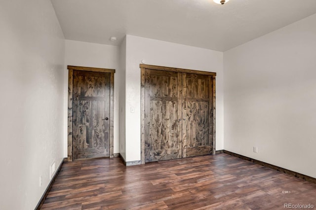 4513 County Road 323, Westcliffe, CO 81252 - unfurnished bedroom with wood finished floors and baseboards