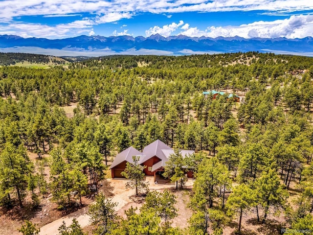 4513 County Road 323, Westcliffe, CO 81252 - view from above of property featuring a forest and a mountain backdrop