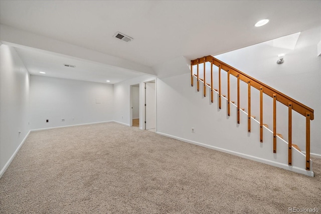 904 Clover Cir, Lafayette, CO 80026 - finished below grade area featuring carpet floors, recessed lighting, baseboards, and stairway