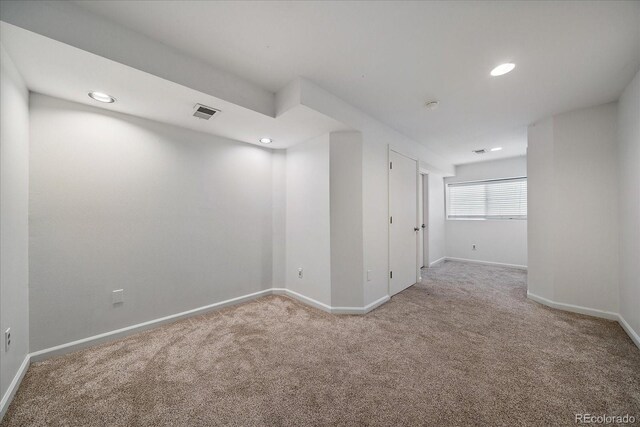 904 Clover Cir, Lafayette, CO 80026 - spare room featuring carpet, baseboards, and recessed lighting