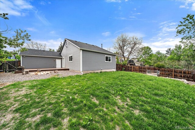904 Clover Cir, Lafayette, CO 80026 - back of property with a wooden deck
