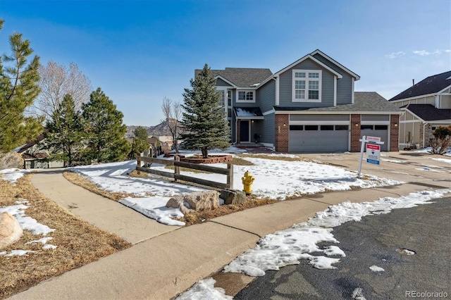 front of property with a garage