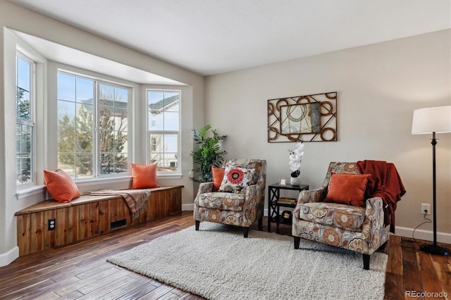 living area featuring hardwood / wood-style floors