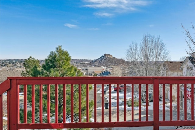 wooden terrace with a mountain view