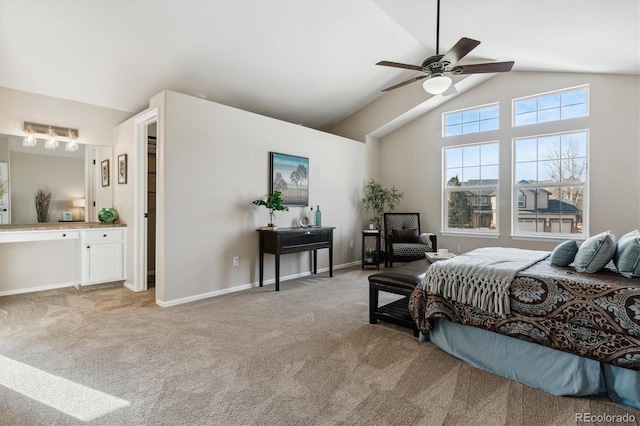 bedroom with ceiling fan, light carpet, and vaulted ceiling