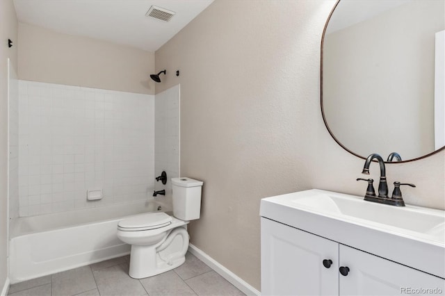 full bathroom featuring tile patterned floors, toilet, vanity, and bathing tub / shower combination