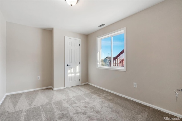 view of carpeted spare room