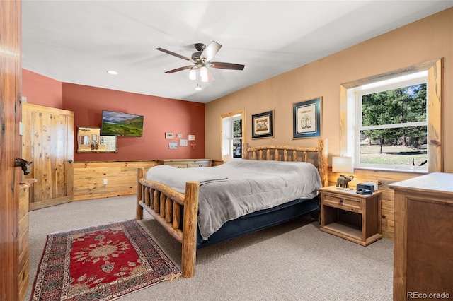 14552 Timber Valley Dr, Weston, CO 81091 - bedroom with carpet, wooden walls, recessed lighting, and ceiling fan
