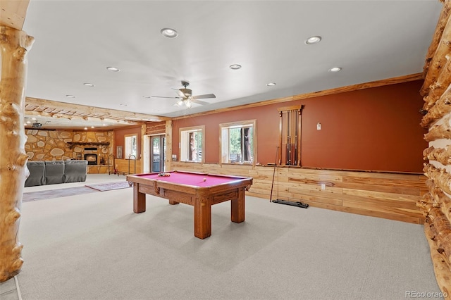 14552 Timber Valley Dr, Weston, CO 81091 - game room with a stone fireplace, carpet floors, wooden walls, recessed lighting, and ceiling fan