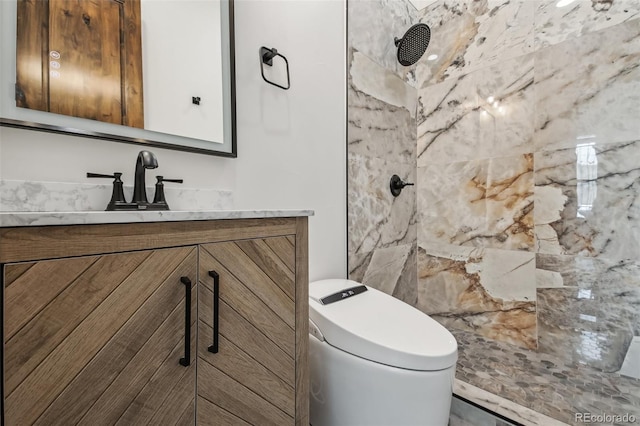 1024 W 8th Ave, Denver, CO 80204 - full bathroom featuring tiled shower, vanity, and toilet
