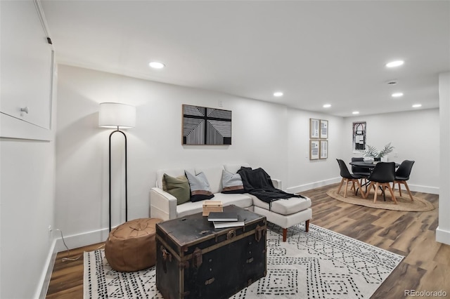 1024 W 8th Ave, Denver, CO 80204 - living area featuring baseboards, wood finished floors, and recessed lighting