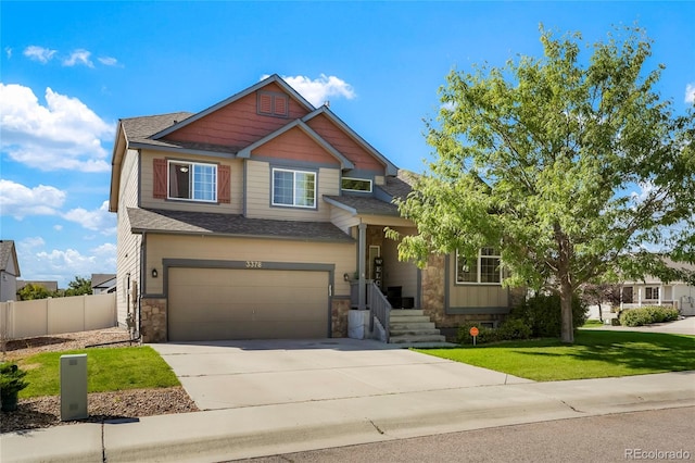 craftsman inspired home with a front lawn and a garage