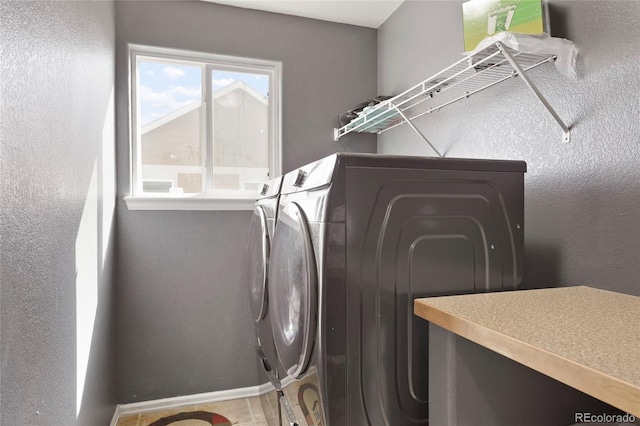 laundry area featuring independent washer and dryer