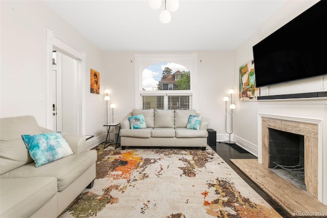 living room with dark hardwood / wood-style flooring