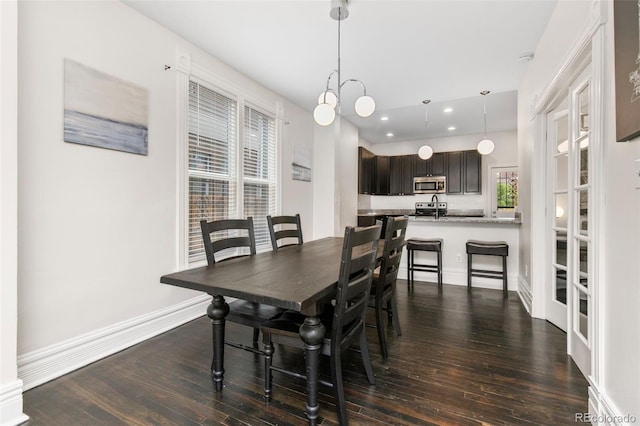 dining space with dark wood-type flooring