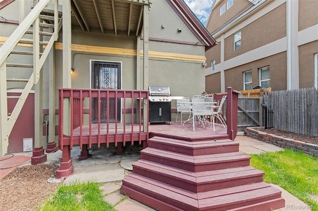 wooden deck with grilling area