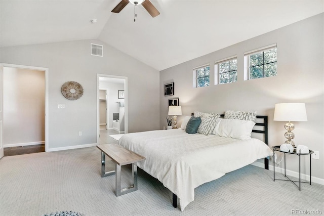 bedroom with lofted ceiling, light colored carpet, visible vents, ceiling fan, and baseboards