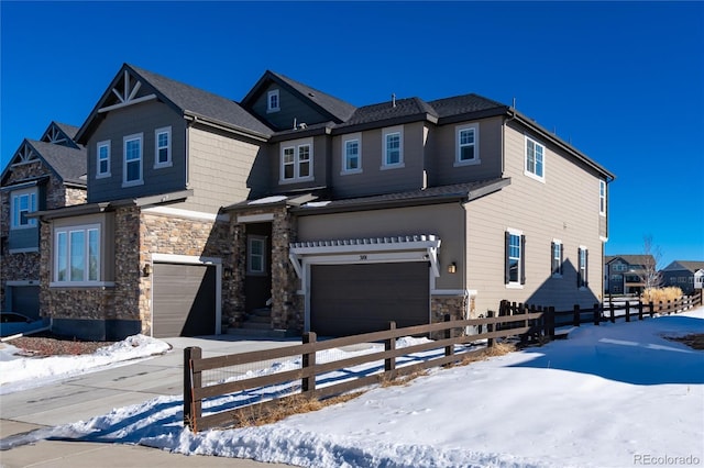 view of front of home with a garage