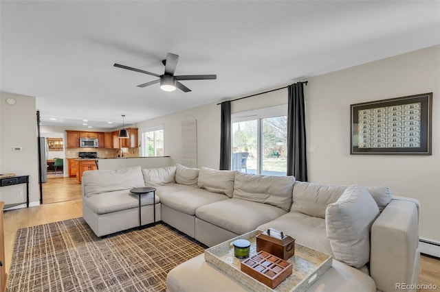 3730 Applewood St, Grand Junction, CO 81506 - living area with ceiling fan, recessed lighting, light wood-style floors, and a healthy amount of sunlight