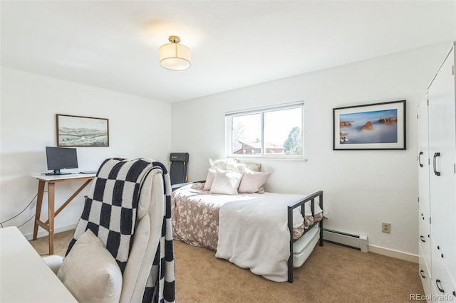 3730 Applewood St, Grand Junction, CO 81506 - bedroom with baseboards, a baseboard heating unit, and light carpet