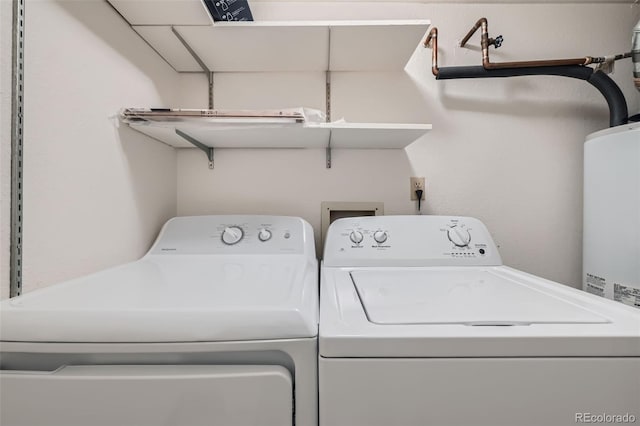 laundry area with washer and clothes dryer