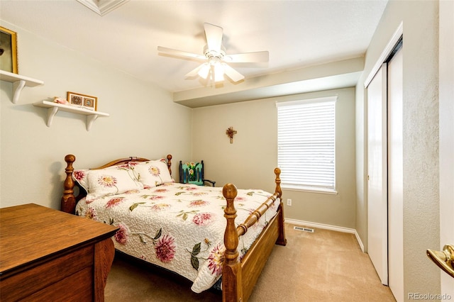 6454 S Nelson Way, Littleton, CO 80127 - bedroom with multiple windows, light carpet, baseboards, and a closet