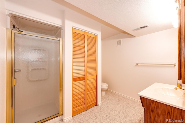 6454 S Nelson Way, Littleton, CO 80127 - full bathroom featuring a shower stall, vanity, toilet, and baseboards