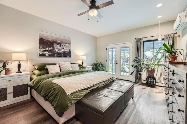 bedroom featuring wood finished floors, access to exterior, recessed lighting, a wall mounted AC, and french doors