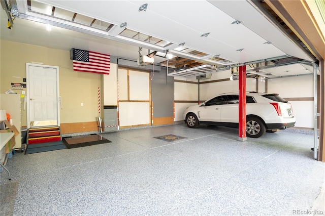 16873 Boreas Ct, Parker, CO 80134 - garage featuring a garage door opener
