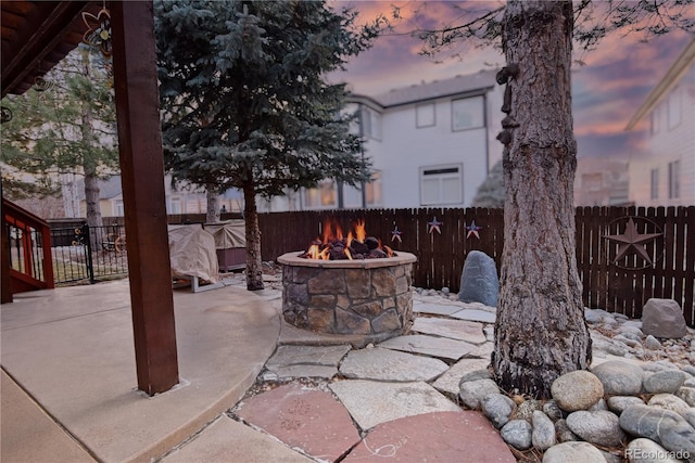 16873 Boreas Ct, Parker, CO 80134 - fenced backyard with an outdoor fire pit and a patio