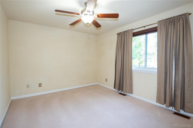 16873 Boreas Ct, Parker, CO 80134 - spare room featuring carpet and a ceiling fan