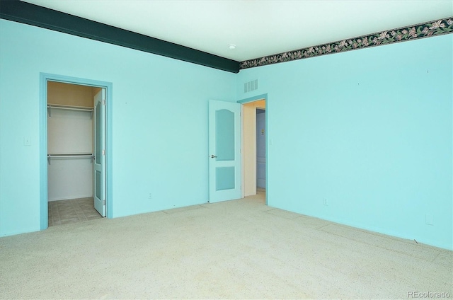27665 County Road 313 Unit 34, Buena Vista, CO 81211 - unfurnished bedroom featuring carpet floors, a spacious closet, and a closet