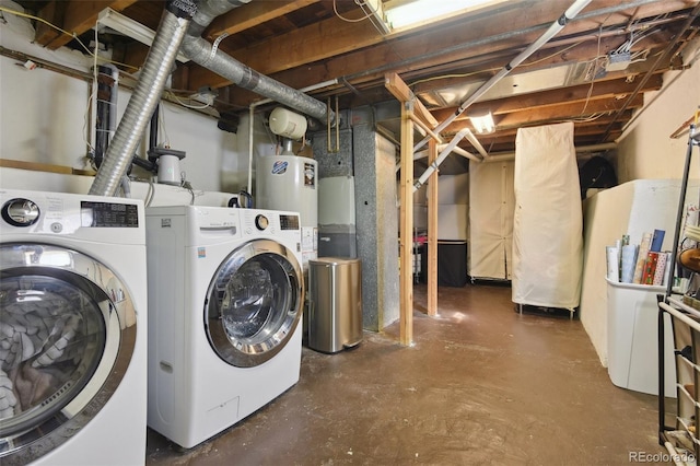 laundry area featuring washer and dryer and laundry area