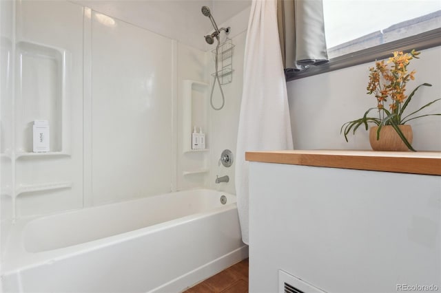 full bathroom featuring shower / bath combination with curtain and wood finished floors