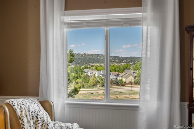 4194 Beautiful Cir, Castle Rock, CO 80109 - sitting room with healthy amount of natural light