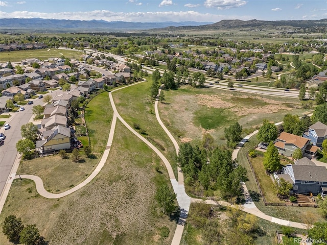 4194 Beautiful Cir, Castle Rock, CO 80109 - aerial overview of property's location with nearby suburban area and mountains