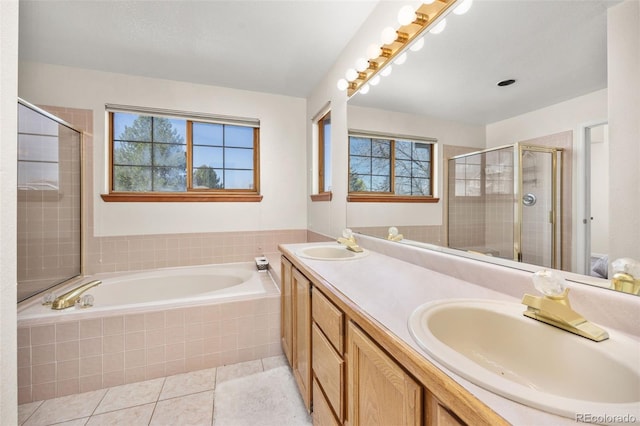 6868 Johnson St, Arvada, CO 80004 - full bathroom with a bath, a shower stall, double vanity, and tile patterned flooring